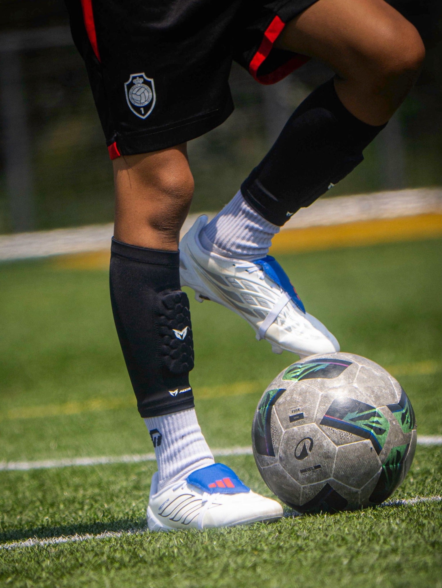 MAESTRO shin guards on pitch